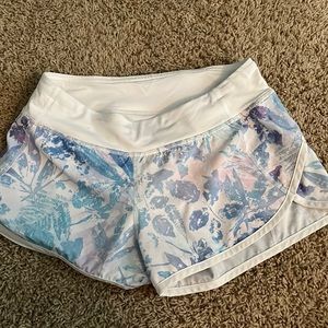 Selling purple and blue and flower shorts size 12 girls Ivivva shorts